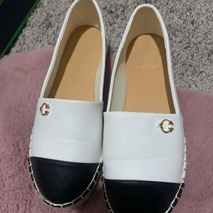 White and black espadrilles shoes